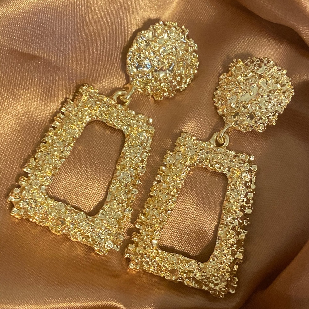 Oversized Doorknocker Golden Earrings with hammered metal detail